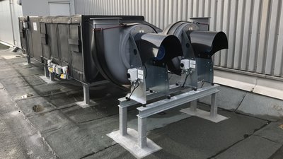 Air handling unit with plastic fans